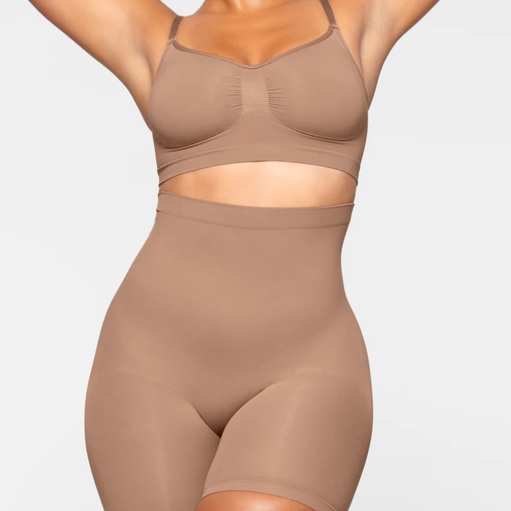 SKIMS Sculpting Mid Thigh Shorts in Sienna